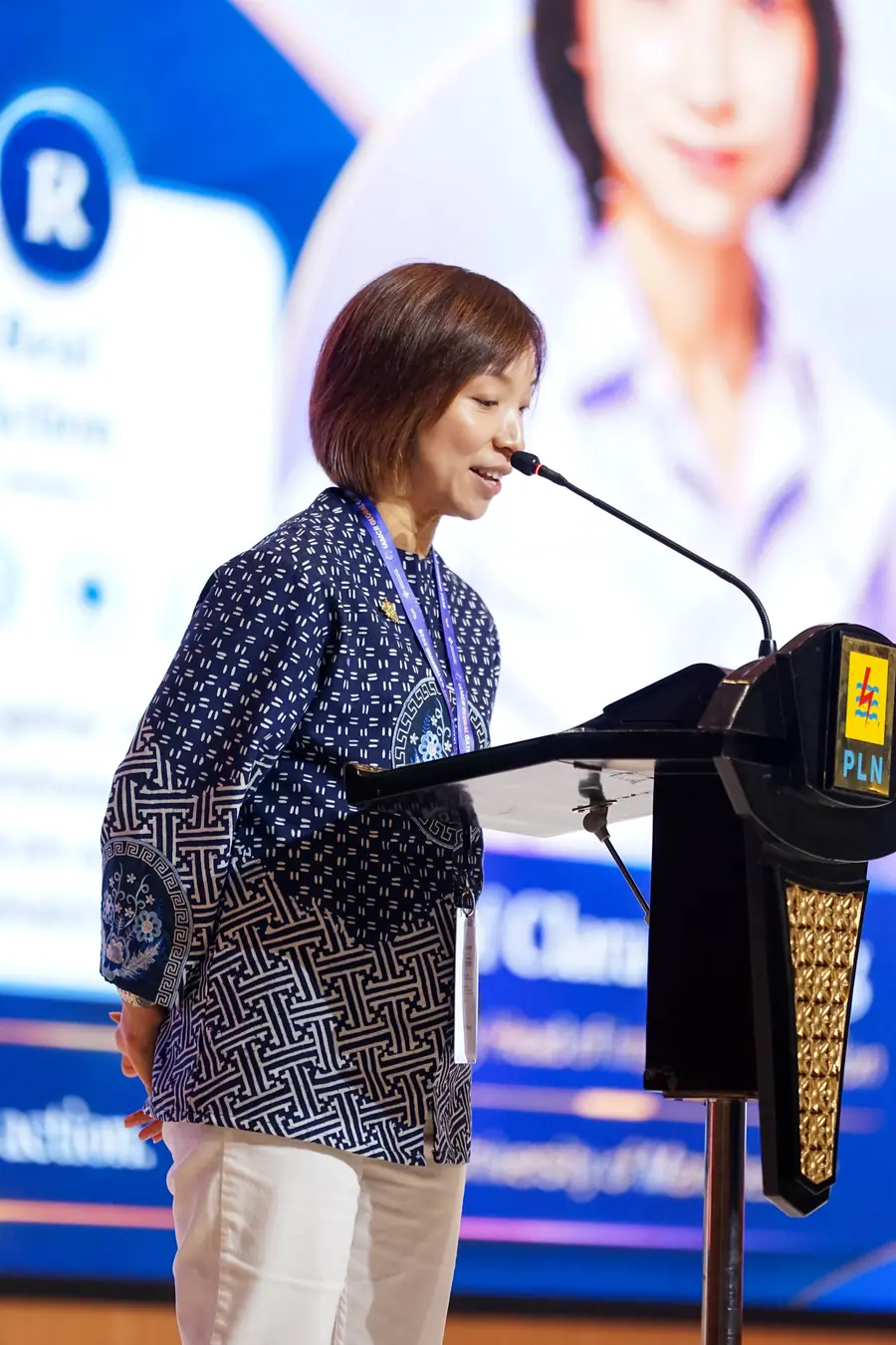 Professor Clara Cheung speaking at the podium