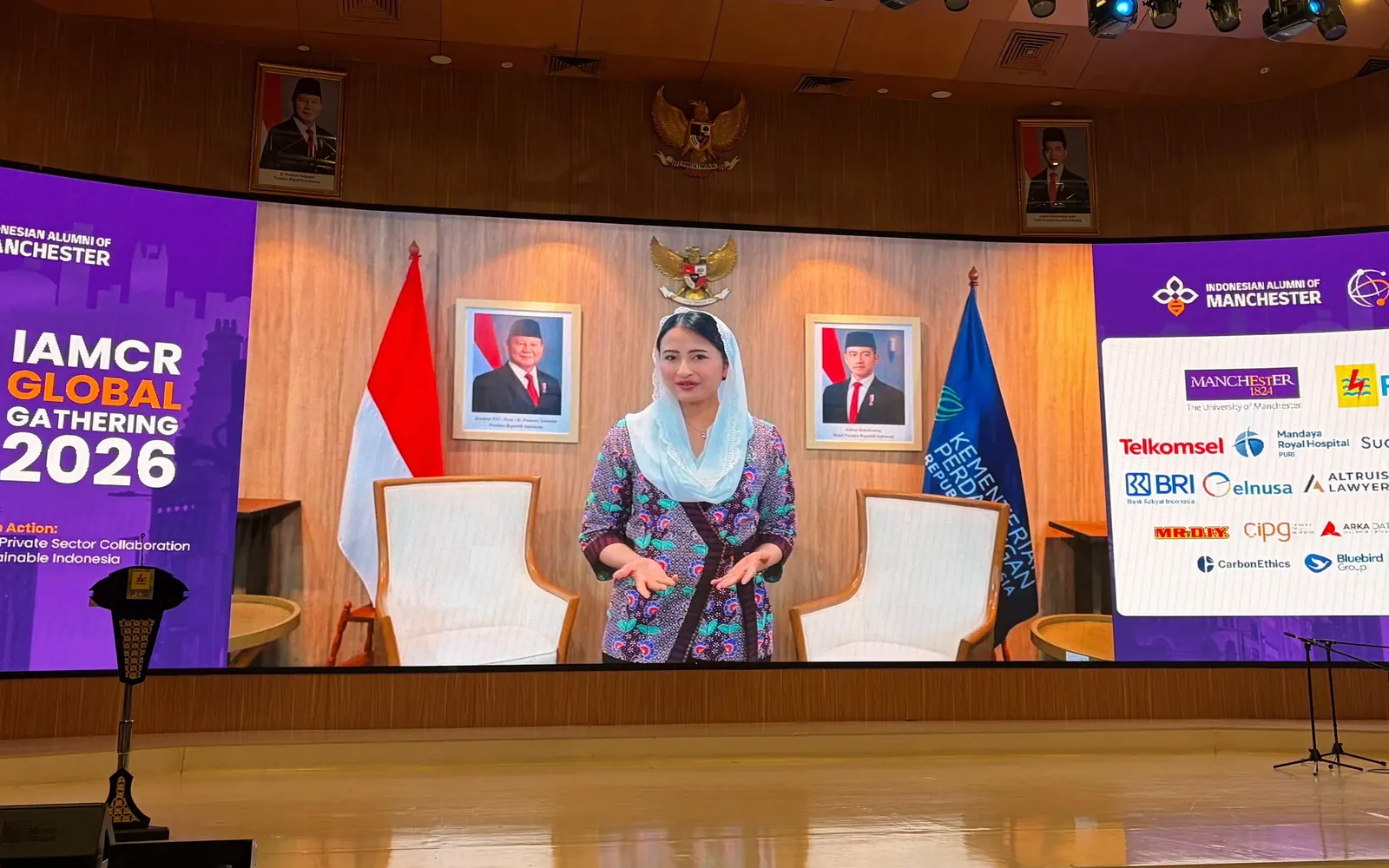 Vice Minister Dyah Roro Esti Widya Putri on the auditorium screen during her virtual keynote