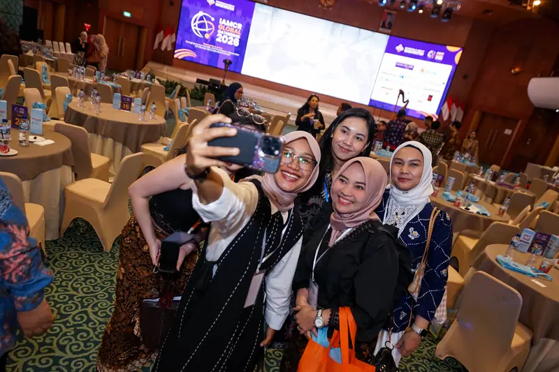 Attendees taking a selfie
